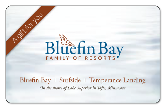 Bluefin bay family of resorts logo on a light blue and white background.